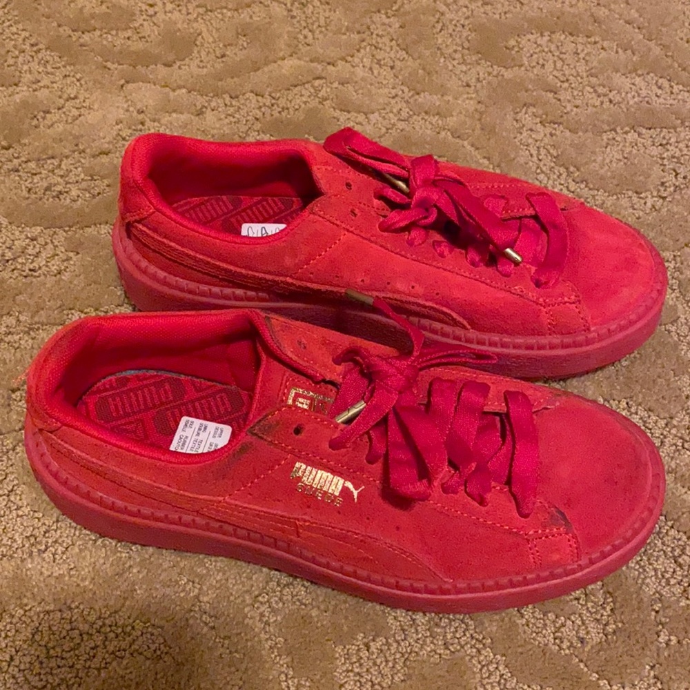 Red puma sneakers